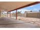 Fenced in backyard with covered patio and stone landscaping at 723 E Piute Ave, Phoenix, AZ 85024