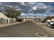 Quiet suburban neighborhood street with single Gathering homes on either side at 723 E Piute Ave, Phoenix, AZ 85024