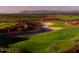 Scenic golf course view featuring lush green fairways, sand traps, and picturesque landscaping at 7681 W Meadowlark Way, Florence, AZ 85132