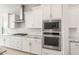 New kitchen design with granite countertops, stainless steel appliances, and custom cabinetry at 7836 W Mockingbird Way, Florence, AZ 85132