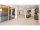 This spacious open floorplan combines the living room, dining, and kitchen areas at 7870 W Mockingbird Way, Florence, AZ 85132