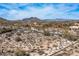 Beautiful desert view with native landscaping and distant homes under a blue sky, great for nature enthusiasts at 8167 E Leaning Rock Rd # 193, Scottsdale, AZ 85266