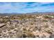 Desert landscape showcasing native greenery and nearby houses on a clear day, ideal for peaceful living at 8167 E Leaning Rock Rd # 193, Scottsdale, AZ 85266