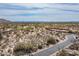 Picture of desert landscape featuring local vegetation, nearby houses, and mountain views on a sunny day at 8167 E Leaning Rock Rd # 193, Scottsdale, AZ 85266