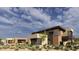Modern home featuring desert landscaping and a detached garage at 8167 E Leaning Rock Rd # 193, Scottsdale, AZ 85266