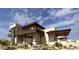 Modern house featuring clean lines, spacious balconies and desert landscaping at 8167 E Leaning Rock Rd # 193, Scottsdale, AZ 85266