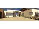 Home with modern design, desert landscaping, and well-lit front entrance at 8167 E Leaning Rock Rd # 193, Scottsdale, AZ 85266