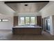 Spacious kitchen with a center island, modern cabinets and three large windows at 8167 E Leaning Rock Rd # 193, Scottsdale, AZ 85266