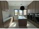 Laundry room boasting new cabinets, modern appliances, and ample countertop space at 8167 E Leaning Rock Rd # 193, Scottsdale, AZ 85266