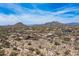 Expansive aerial view of the community, showcasing mountain views and neighborhood features at 8395 E Leaning Rock Rd # 187, Scottsdale, AZ 85266