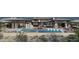 Expansive backyard features a pool, hot tub, outdoor kitchen and ample lounge areas for entertaining at 8395 E Leaning Rock Rd # 187, Scottsdale, AZ 85266