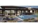 Luxury backyard showcases a stunning pool, chic lounge chairs, and modern outdoor furniture at 8395 E Leaning Rock Rd # 187, Scottsdale, AZ 85266