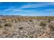 Scenic view of a desert community with various homes surrounded by native landscaping and open space at 8395 E Leaning Rock Rd # 187, Scottsdale, AZ 85266