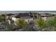 This modern home features desert landscaping, offering a beautiful blend of architecture and nature at 8395 E Leaning Rock Rd # 187, Scottsdale, AZ 85266