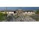 Desert landscaping surrounds this modern home, creating a serene and private setting at 8395 E Leaning Rock Rd # 187, Scottsdale, AZ 85266