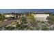 The property showcases desert landscaping, a private driveway, and a sleek, modern home design at 8395 E Leaning Rock Rd # 187, Scottsdale, AZ 85266