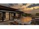 Backyard oasis with a pool, lounge seating, outdoor dining, and sunset views at 8395 E Leaning Rock Rd # 187, Scottsdale, AZ 85266