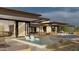 Backyard featuring a pool, patio furniture, outdoor dining, and desert views at 8395 E Leaning Rock Rd # 187, Scottsdale, AZ 85266