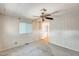 This bedroom has a ceiling fan, carpet, and window that allows for natural light; providing a comfortable retreat at 8600 E Broadway Rd # 28, Mesa, AZ 85208
