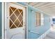 A close-up of the home's entrance, featuring a decorative door and a convenient handrail for added accessibility at 8600 E Broadway Rd # 28, Mesa, AZ 85208
