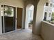 Private tiled balcony featuring archways, and a sliding glass door at 10401 N 52Nd St # 124, Paradise Valley, AZ 85253