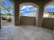 Tiled balcony featuring archways with views of a landscaped exterior at 10401 N 52Nd St # 124, Paradise Valley, AZ 85253