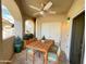 Covered patio featuring a ceiling fan and outdoor seating, perfect for enjoying the breeze at 10401 N 52Nd St # 124, Paradise Valley, AZ 85253