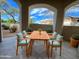 Relax outdoors in this cozy patio with a lovely table and chair set, with views of the neighborhood at 10401 N 52Nd St # 124, Paradise Valley, AZ 85253