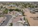 Panoramic aerial view showcasing a peaceful suburban setting with mature trees, and spacious lots at 10505 W Wilshire Dr, Avondale, AZ 85392