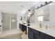 Elegant bathroom featuring a double vanity, designer finishes, and a spa-like ambiance at 10505 W Wilshire Dr, Avondale, AZ 85392