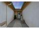 Charming entryway features a stone walkway, neutral stucco walls and front door with decorative wreath at 10505 W Wilshire Dr, Avondale, AZ 85392