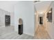 Bright hallway with clean lines and modern decor leads to various rooms in the home at 10505 W Wilshire Dr, Avondale, AZ 85392