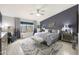 Serene main bedroom featuring stylish decor, ample natural light, and a cozy atmosphere at 10505 W Wilshire Dr, Avondale, AZ 85392