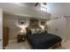 Cozy bedroom with high ceilings, neutral colors, and a barn door leading to a walk-in closet at 10557 E Fanfol Ln, Scottsdale, AZ 85258