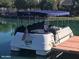 Pontoon boat docked in the water, featuring Scottsdale Ranch signage at 10557 E Fanfol Ln, Scottsdale, AZ 85258