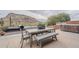 Outdoor dining area with a view of the desert mountains at 10672 N 140Th Way, Scottsdale, AZ 85259