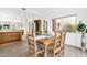 Bright dining room features neutral decor, tile flooring, and a large window with outdoor views at 11686 N Spotted Horse Way, Fountain Hills, AZ 85268