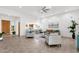 Spacious living room with tiled flooring, a wet bar and great natural light at 11686 N Spotted Horse Way, Fountain Hills, AZ 85268