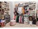 Organized walk-in closet with ample shelving, hanging rods, and storage solutions at 12320 W Lone Tree Trl, Peoria, AZ 85383