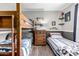 ' bedroom with bunk beds, a twin bed, and decoratively themed shelves at 12402 N 36Th Dr, Phoenix, AZ 85029