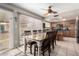 Bright dining area next to efficient kitchen features ample counter space and modern appliances at 12402 N 36Th Dr, Phoenix, AZ 85029