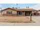 Charming single-story home with a covered porch and a low-maintenance front yard at 12402 N 36Th Dr, Phoenix, AZ 85029