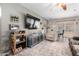 Spacious living room features modern decor and a ceiling fan at 12402 N 36Th Dr, Phoenix, AZ 85029