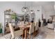 Dining room filled with natural light and stylish light fixtures at 1356 E Desert Flower Ln, Phoenix, AZ 85048