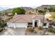 Charming single Gathering home with well-manicured desert landscaping and mountain views at 1356 E Desert Flower Ln, Phoenix, AZ 85048