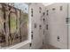 Modern shower with dual shower heads and gray tile at 1356 E Desert Flower Ln, Phoenix, AZ 85048