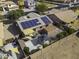 Aerial view of a home featuring solar panels, a covered patio, shed, and a gazebo in a walled backyard at 1391 E 12Th St, Casa Grande, AZ 85122