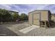 Backyard featuring storage shed, gravel groundcover, and stepping stone path at 1391 E 12Th St, Casa Grande, AZ 85122