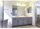 Bathroom with dual sinks and spacious vanity at 1391 E 12Th St, Casa Grande, AZ 85122