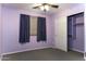 Bedroom with ceiling fan and closet at 1391 E 12Th St, Casa Grande, AZ 85122